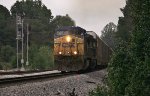 CSX C40-8Ws 7670 and 7618 haul autoracks past the signals